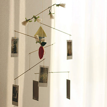 Hanging mobile with instax photos